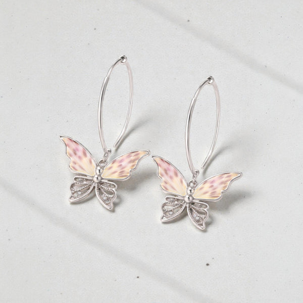 Arete Mariposa con flor de andromelia