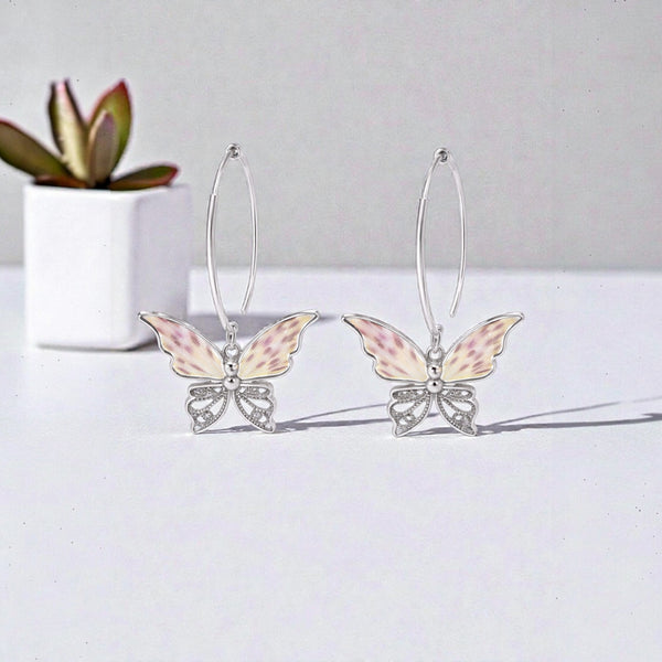 Arete Mariposa con flor de andromelia